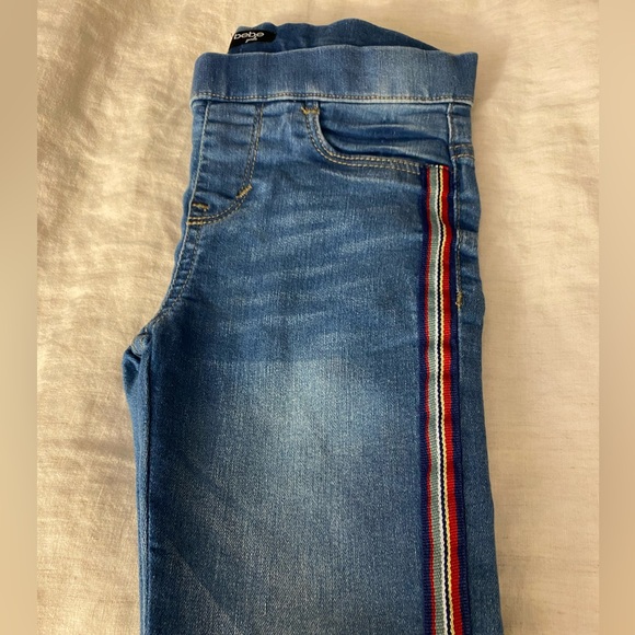 Bebe Girl’s Size 8 pull on jeans with stripes on the side - Picture 3 of 4